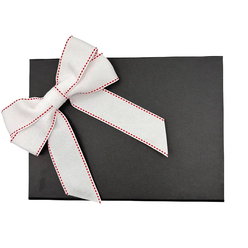 white ribbon bow